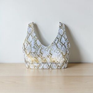 Fabletics White and Gold Snake-Print Scoop Sports Bra